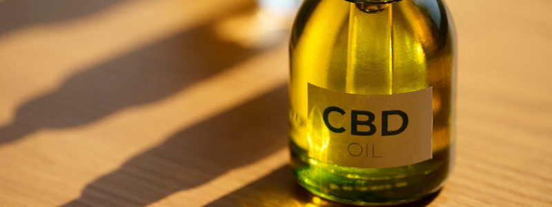 CBD oil massage add-on at Uniq Massage in McKinney TX for muscle soreness relief and inflammation reduction